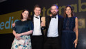 Ainslie Macleod, associate director, Carbon Trust (far left) and compere Julia Bradbury present Whitbread's team with the award.